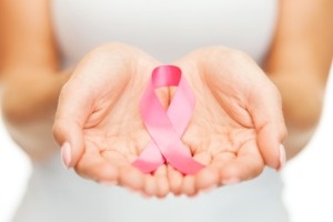 Pink Ribbon in hands 