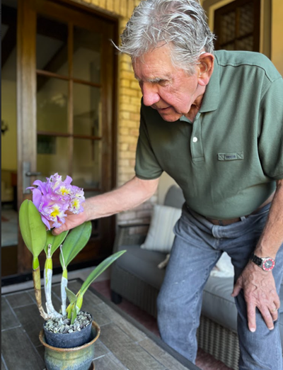 Len Grabowski with orchid Len Grabowski with orchid