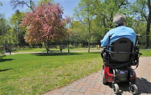Man in wheelchair Man in wheelchair