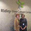 WomeninfrontofRidley-TreeCancerCentersign