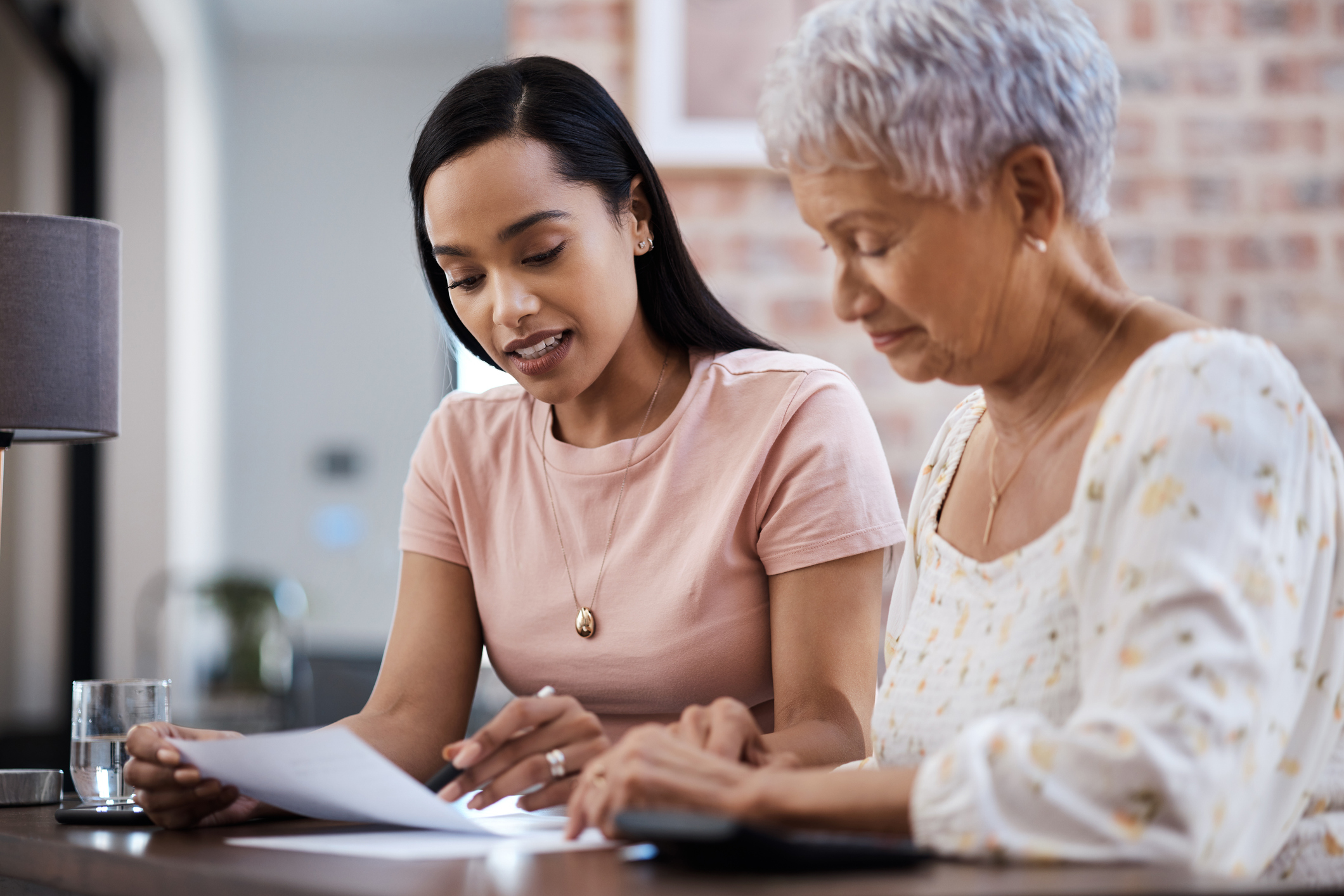 woman receiving help filling out her advance directive