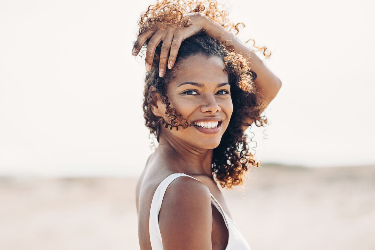 Smiling woman at the beach