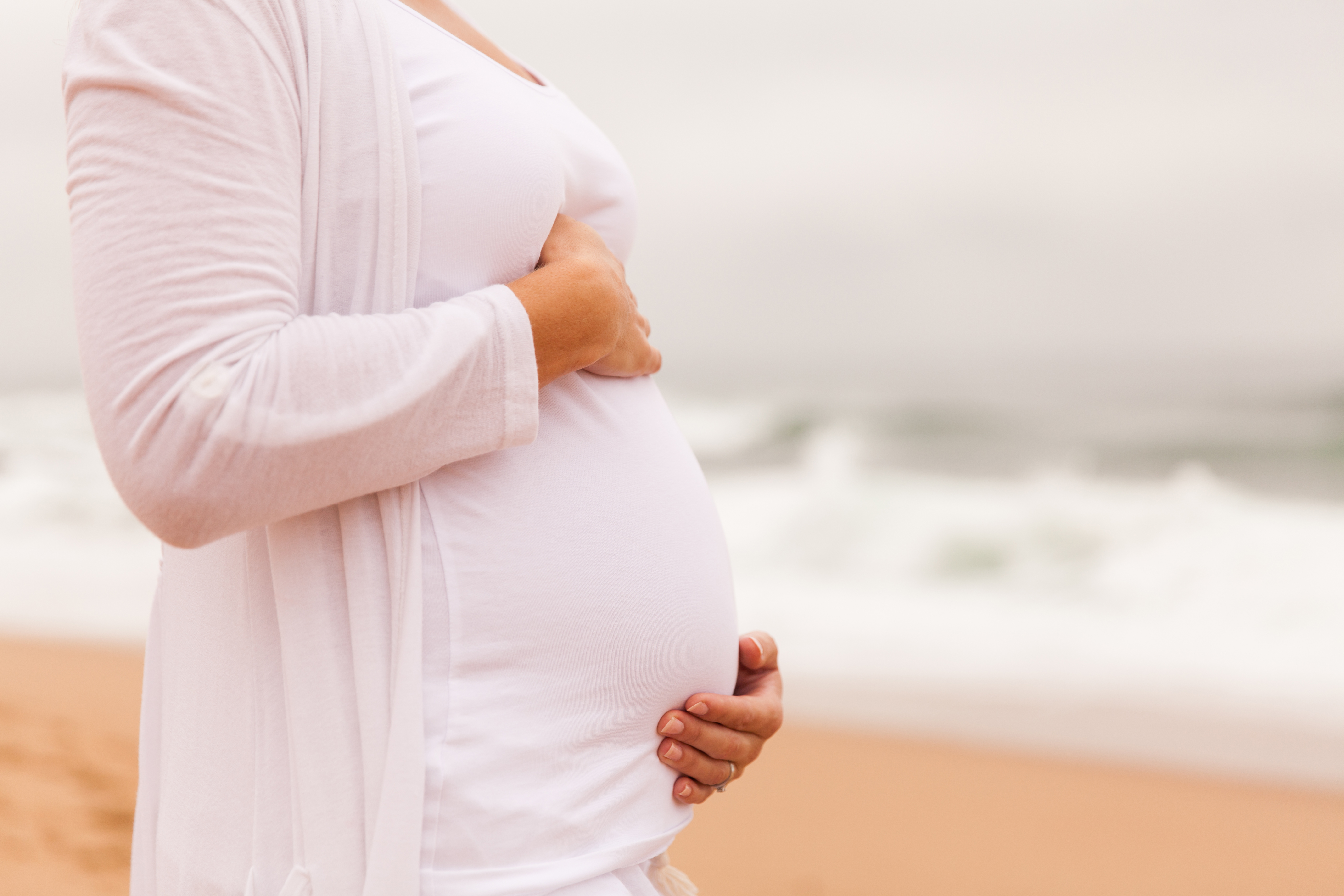 Pregnantwomanonbeach